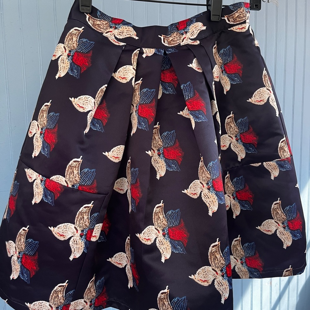 Fashion designer Dimple Hsu.Brand new Women's summer dark blue flower skirt